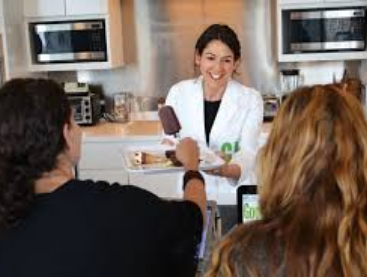 Samantha Cassetty handing out healthy dessert treats