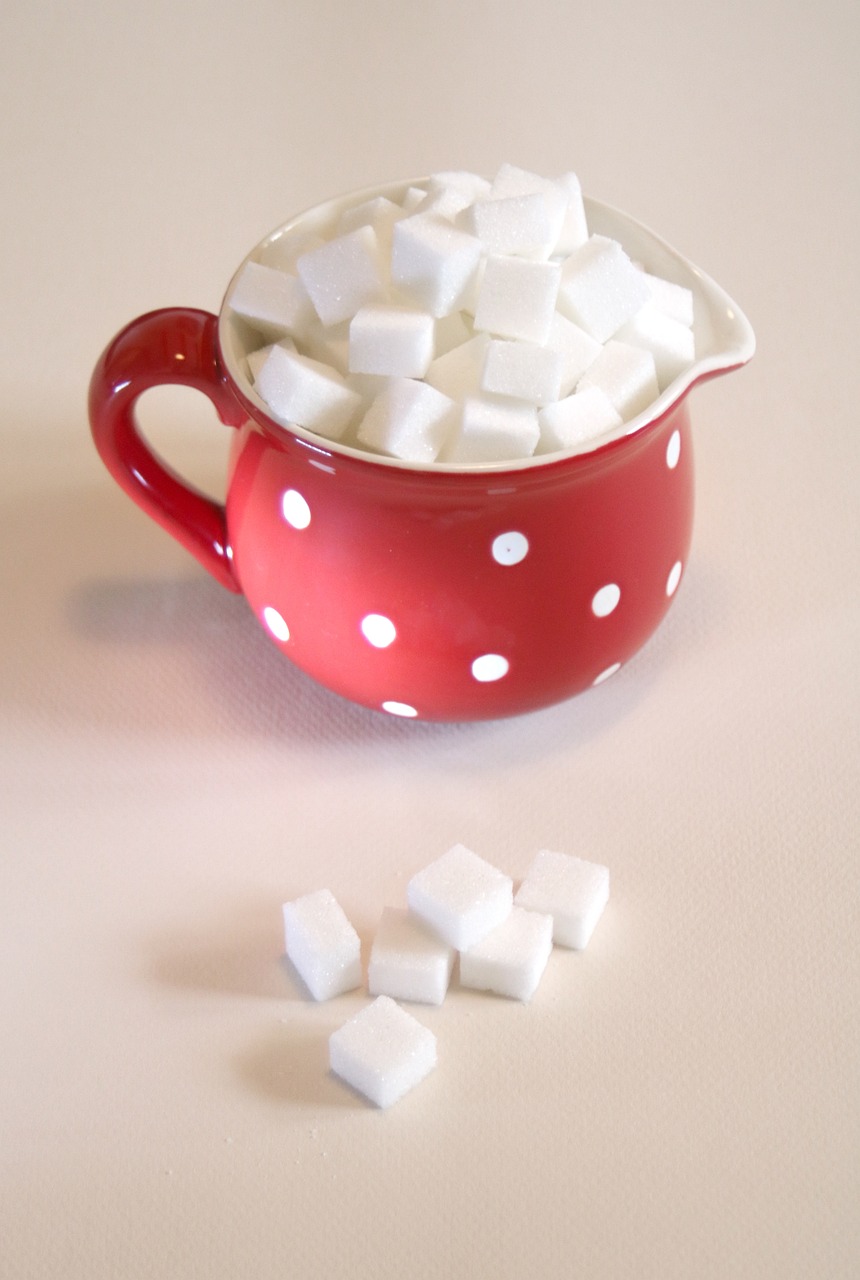 Red cup with sugar cubes
