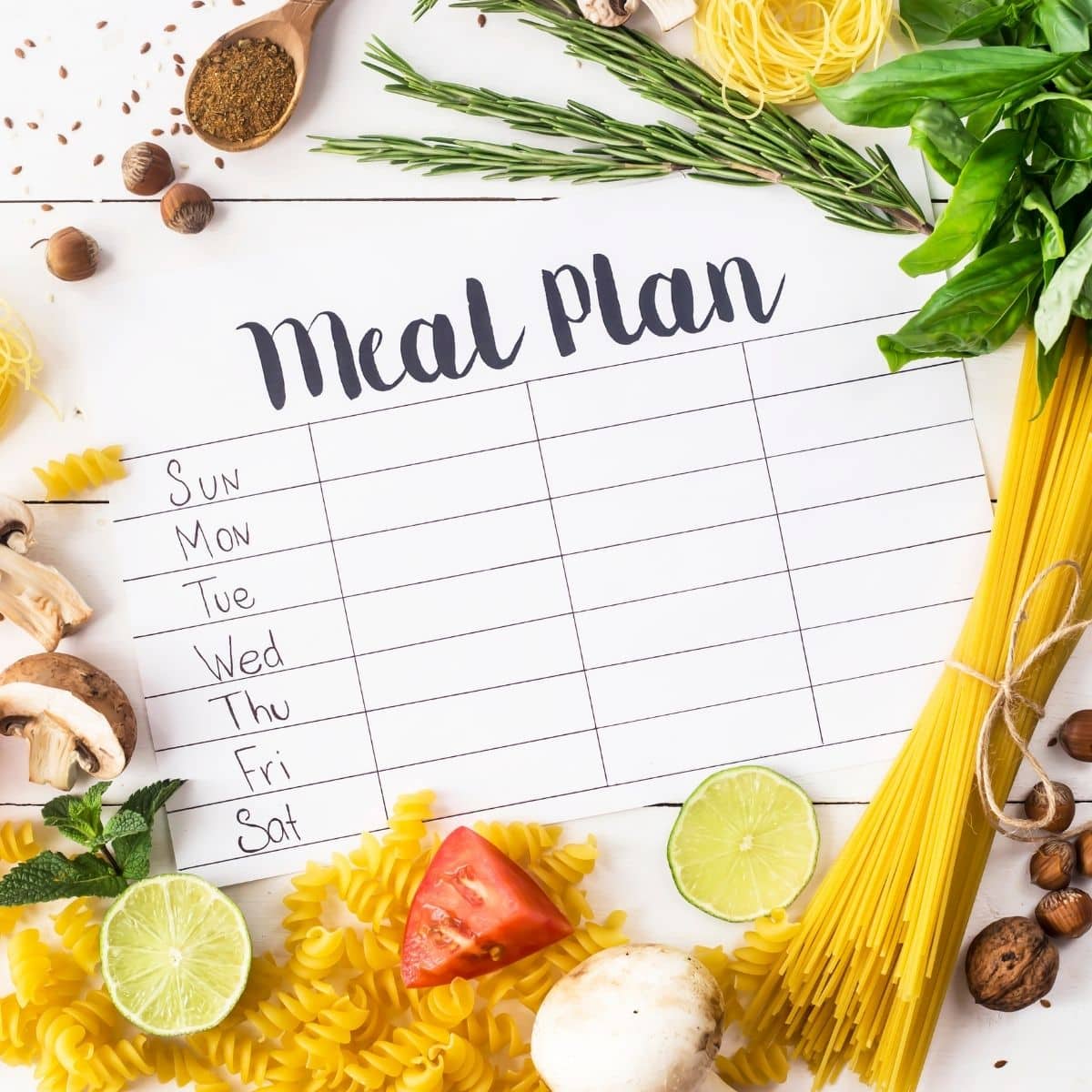 Image of a meal plan calendar surrounded by fruits, veggies and grains