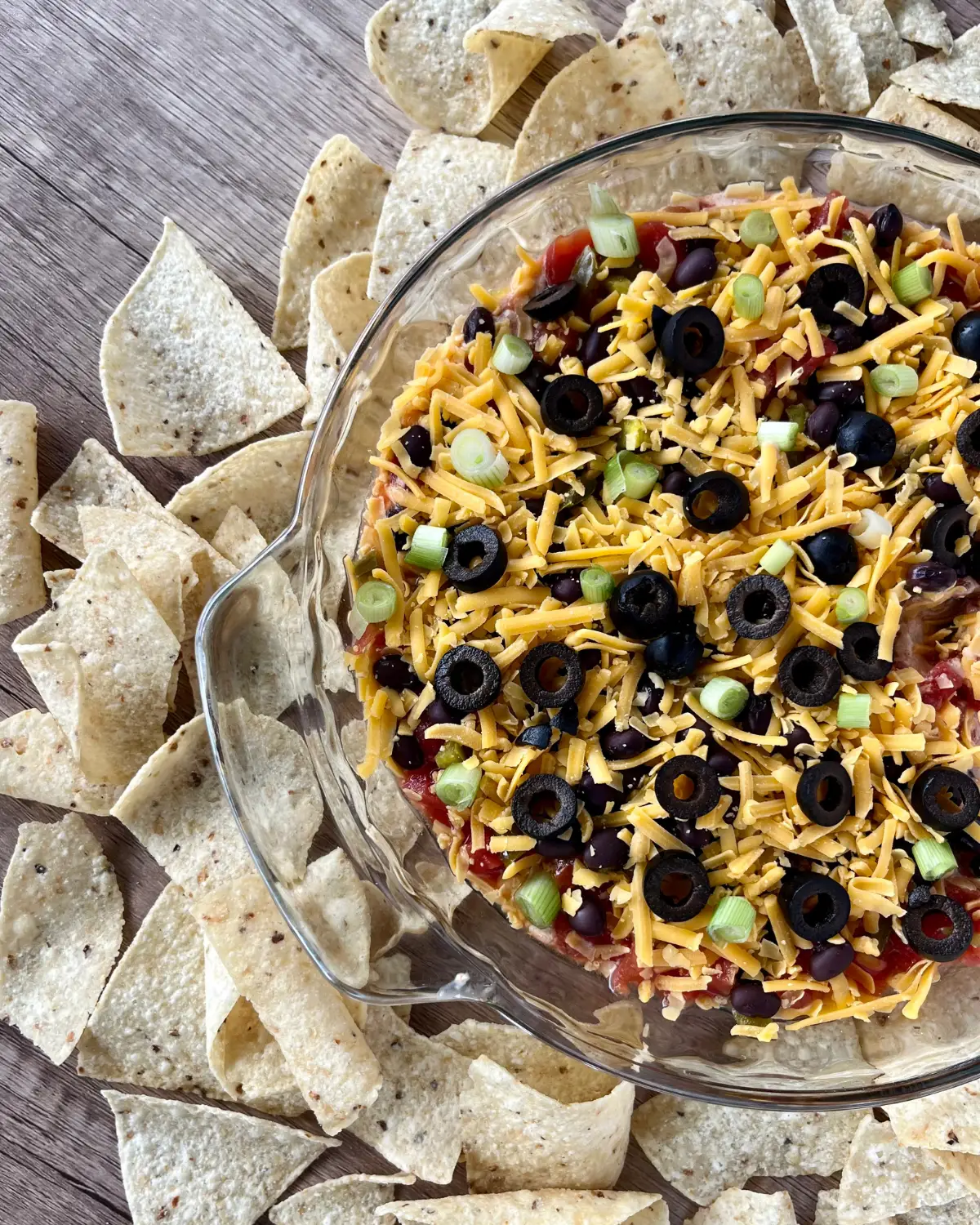 Image of high protein taco dip that looks like a 9-layer bean dip
